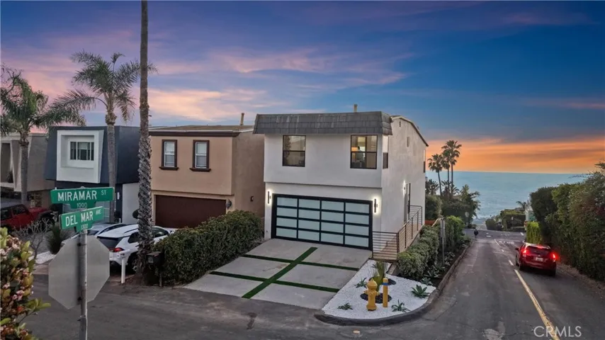 Charming coastal exterior with inviting curb appeal