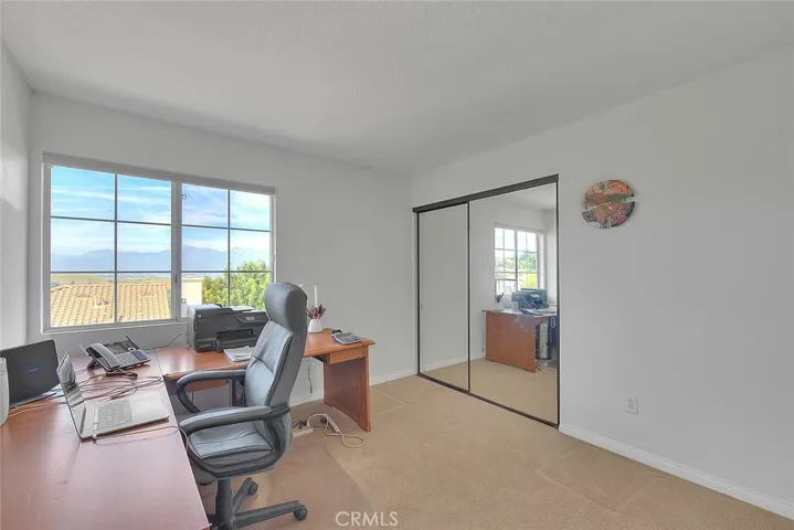 3rd guest bedroom w/mountain views, currently used as home office