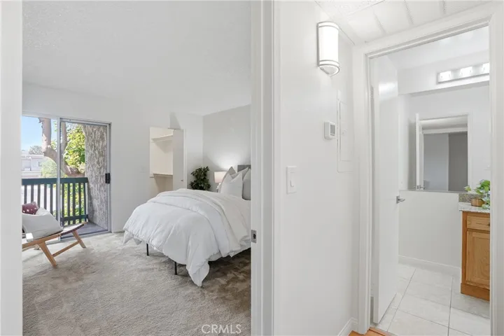 On the other side of the home is bedroom 2 with a dedicated bathroom in the hall.