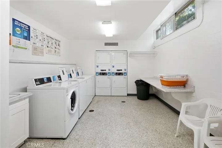 Community laundry room located on the garage level of the building.