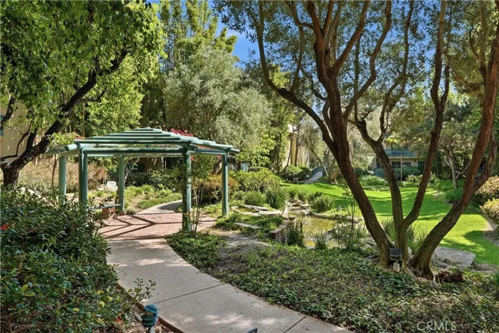 Luscious green spaces and koi ponds throughout the community.