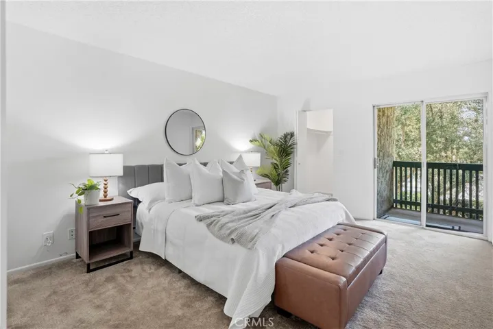 Primary ensuite has balcony access.