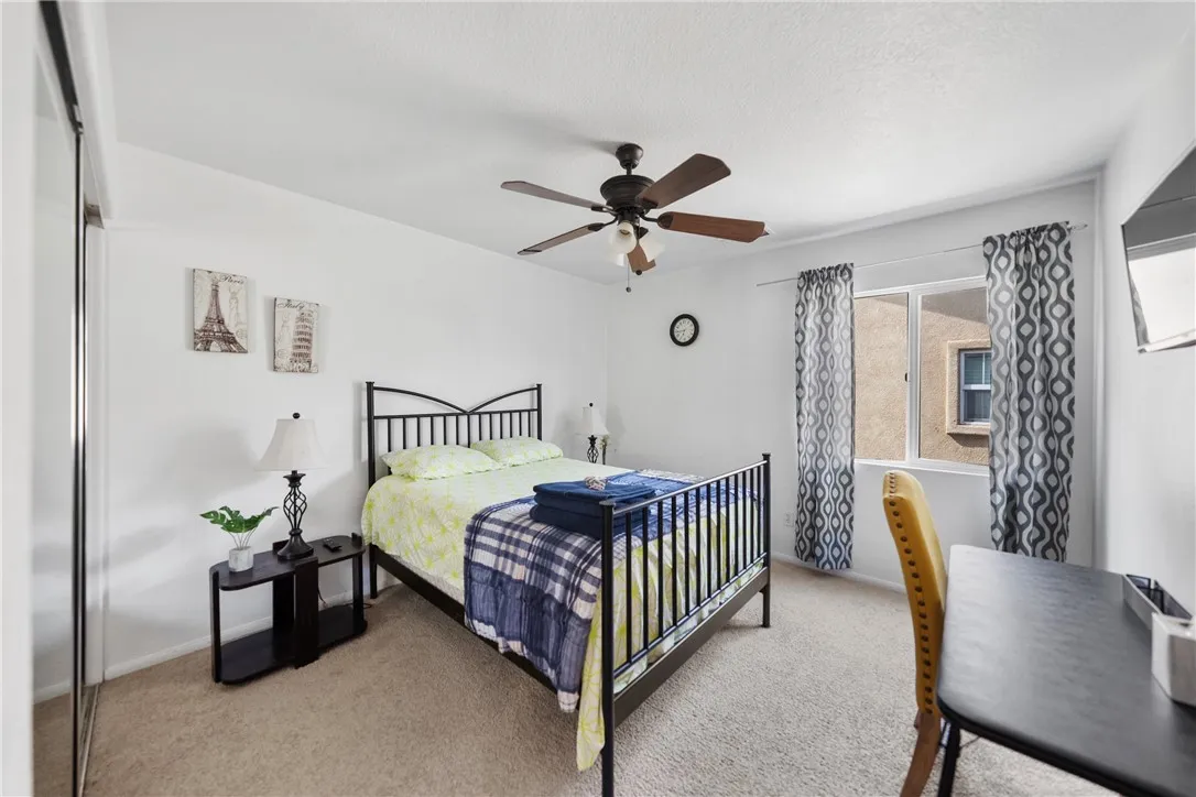 Digitally staged to show full potential-bed 5 upstairs