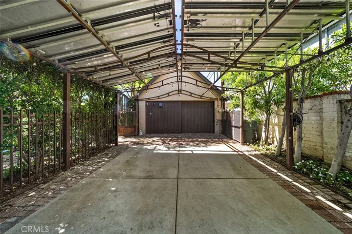 Covered driveway can be a great place to also place tables and chairs when entertaining a large party.