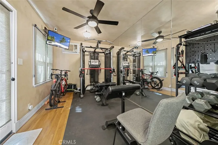 Gym in converted garage with 3/4 bathroom.