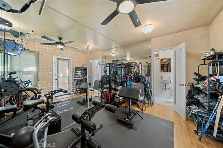 Gym in converted garage with 3/4 bathroom.