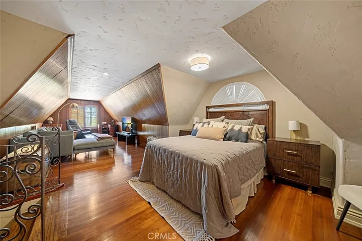 A creative space upstairs with walk in closet and half bathroom. This could be used as a bedroom or casual living area or an artists retreat to paint, play music, write or maybe a craft room. You decide.
