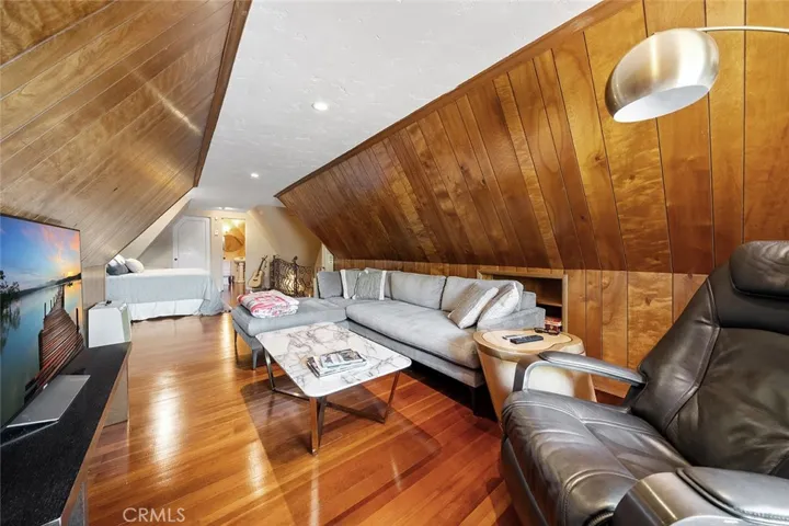 A creative space upstairs with walk in closet and half bathroom. This could be used as a bedroom or casual living area or an artists retreat to paint, play music, write or maybe a craft room. You decide.