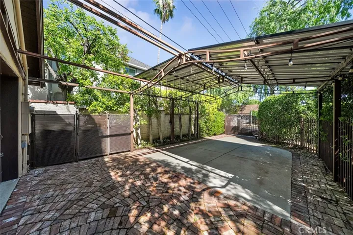 Driveway off from Martelo Ave. Spacious and a nice place to have tables and chairs when entertaining a large party.