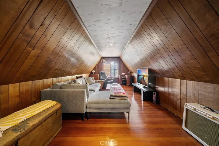 A creative space upstairs with walk in closet and half bathroom. This could be used as a bedroom or casual living area or an artists retreat to paint, play music, write or maybe a craft room. You decide.