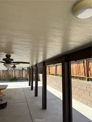 Large concrete covered patio (2nd photo)