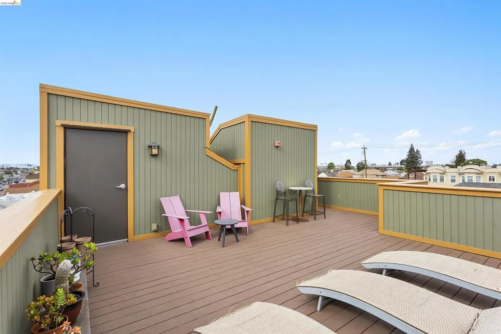 Wooden deck with a residential view