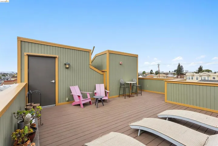Wooden deck with a residential view