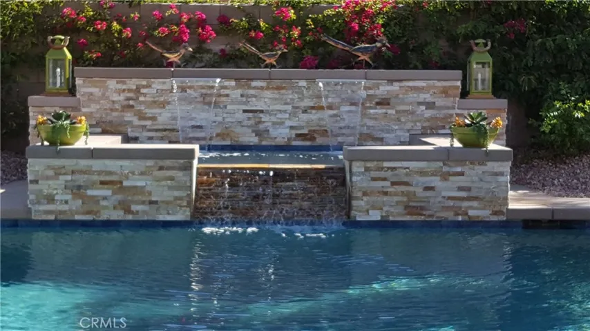 Spa with waterfall into the pool