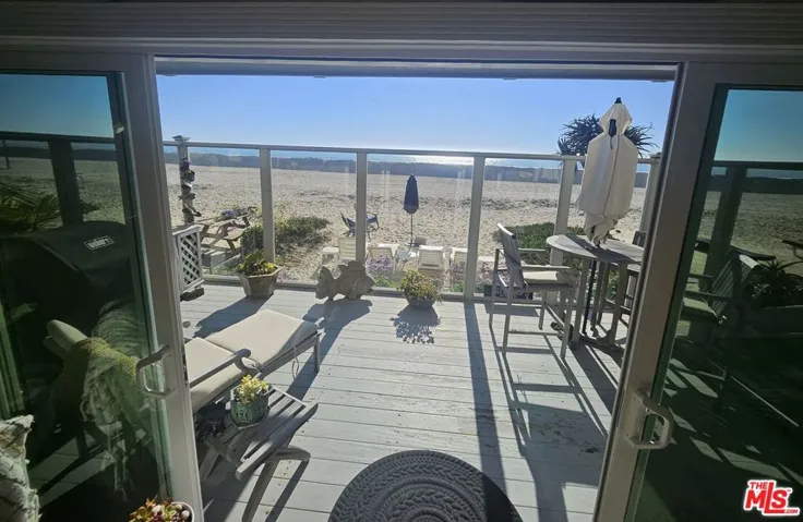 Outdoor deck with tall wind sc