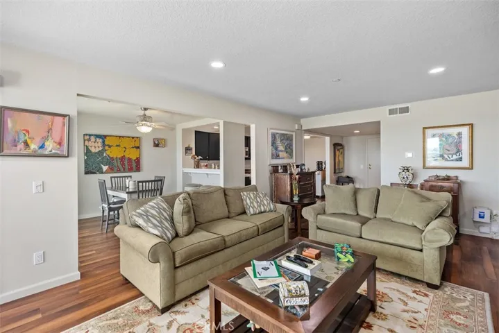 Open floorplan to the kitchen and dining room.