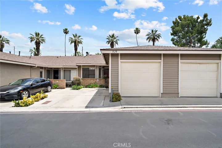 One car garage and a one car driveway.