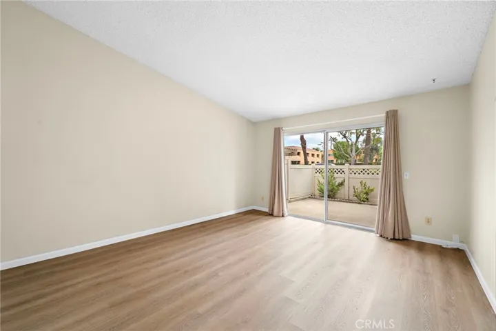 Living Room with sliding door access to the large patio.