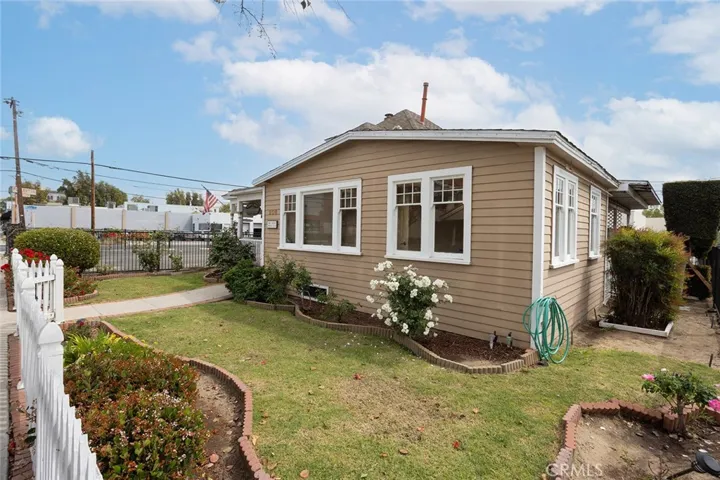 Great Curb Appeal with Frontyard and White Picket Fence