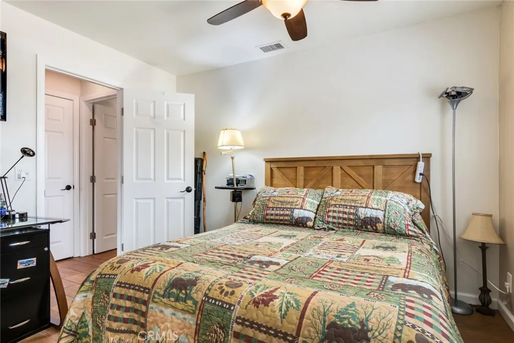 Bedroom #2 with Ceiling Fan and Views of Backyard