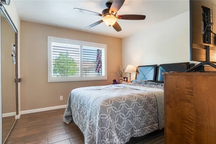 Bedroom #1 with Ceiling Fan and Views of Front