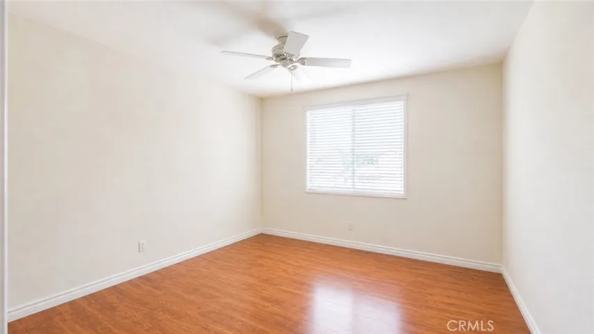 Furniture removed digitally - Upstairs Bedroom w/ Ceiling Fan