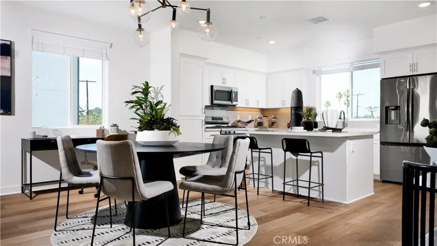 the open concept design allows all of the main living areas to flow together seamlessly.