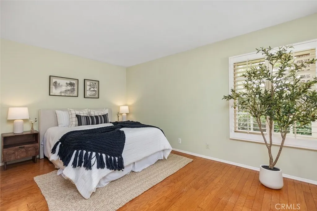 Guest bedroom #3 located in the front right corner of the home.