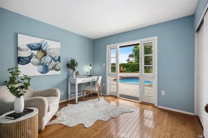 Guest bedroom #1 or office has easy access to the pool deck.