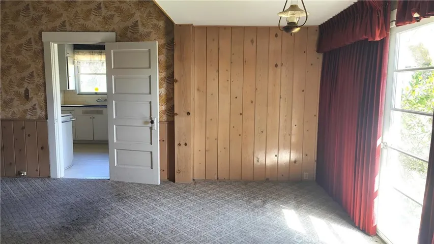 Dining room or family room and view of kitchen
