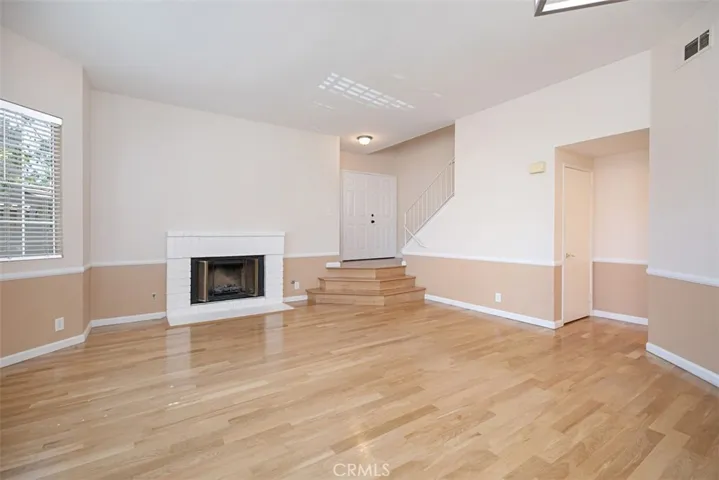 Hardwood floors. 
NOT Laminate.