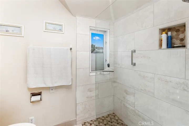 Master walk in Showers with Ocean View
