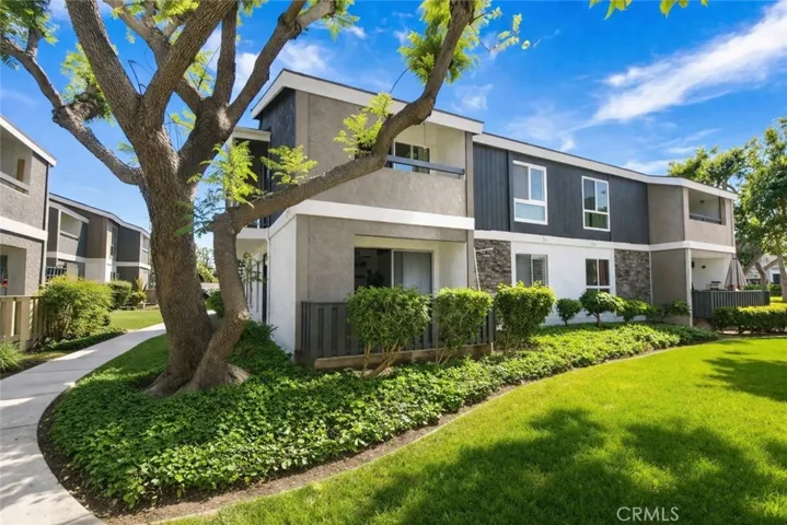 Lush green courtyard with mature trees