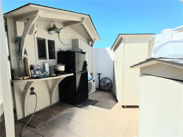 Dine Al Fresco from the custom outdoor kitchen