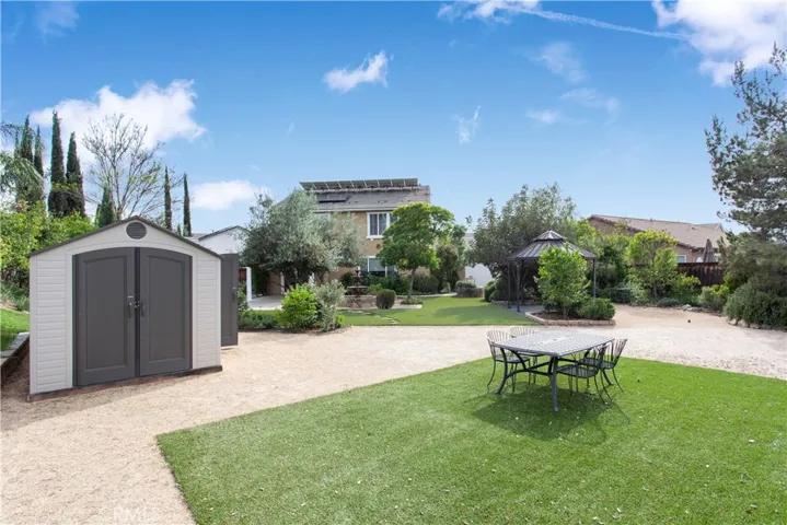 From back corner of the property. Again 1/3 acre - let your imagination run free OR enjoy this serene setting as it is.