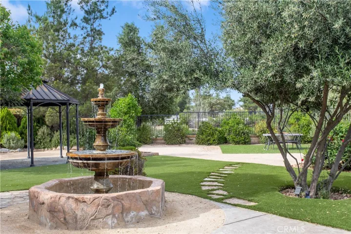 Beautiful landscaping and privacy from the walking trails behind property