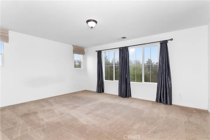 Primary w/ view of beautiful backyard