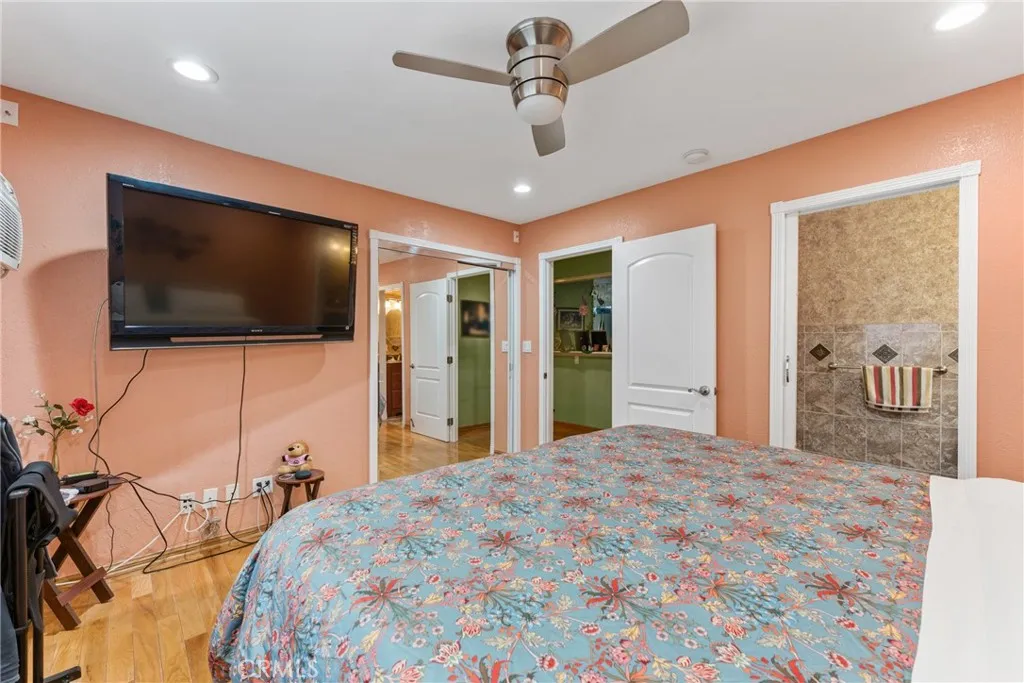 Downstairs bedroom with half bathroom