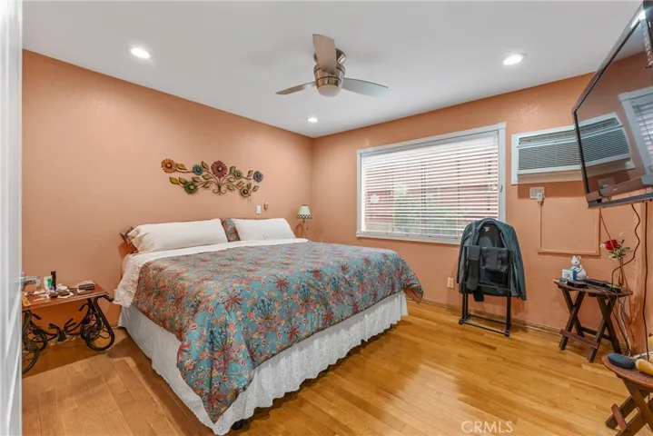 Downstairs bedroom with half bathroom