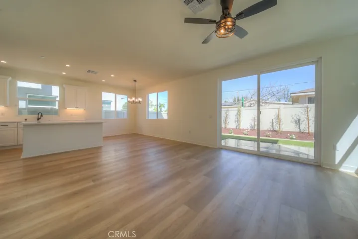 Family room has 8' x 8' foot sliding door to the private back yard.