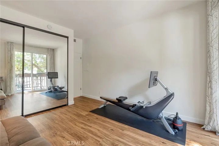 Mirrored closet doors in guest bedroom