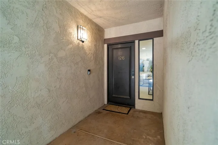 Private entryway to corner unit