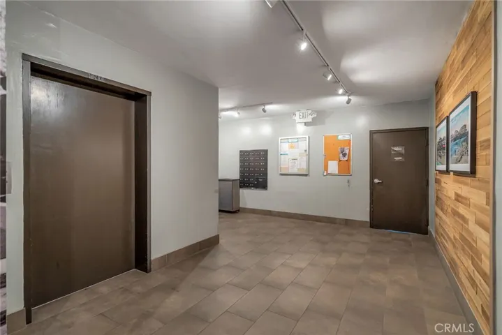 Lobby area with elevator and mailboxes