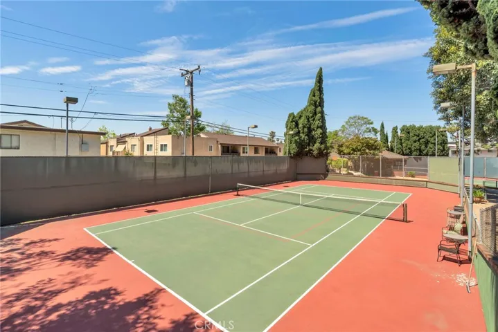 Community tennis and pickleball courts with clubhouse
