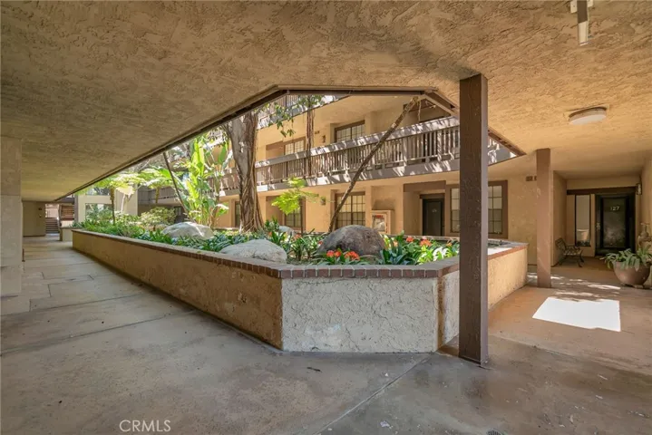 View from front door entryway; Lush and immaculately maintained landscaping