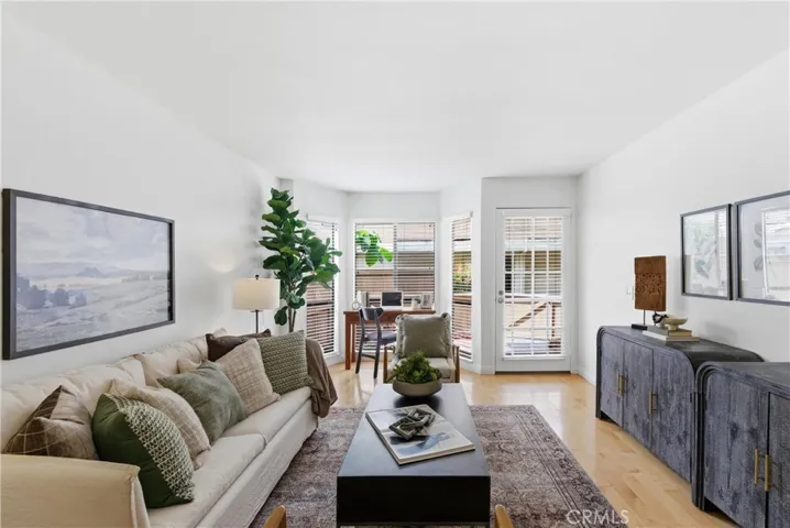 Bay window and French door let in natural light.