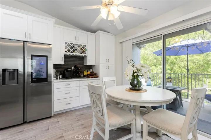 The dining room is open to the kitchen and living rooms