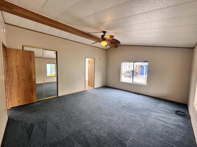 Primary bedroom off main living area.