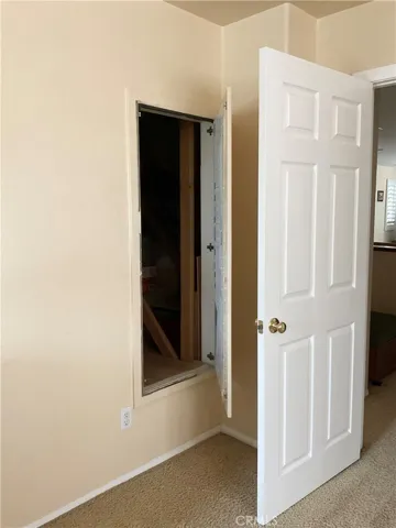 Door to attic..BIG PLUS. Approx. 164 sqft.
