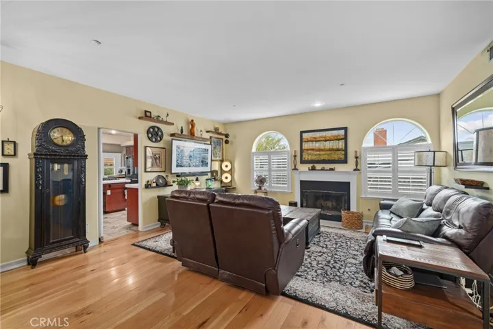 Cozy family room with fireplace right off the kitchen.